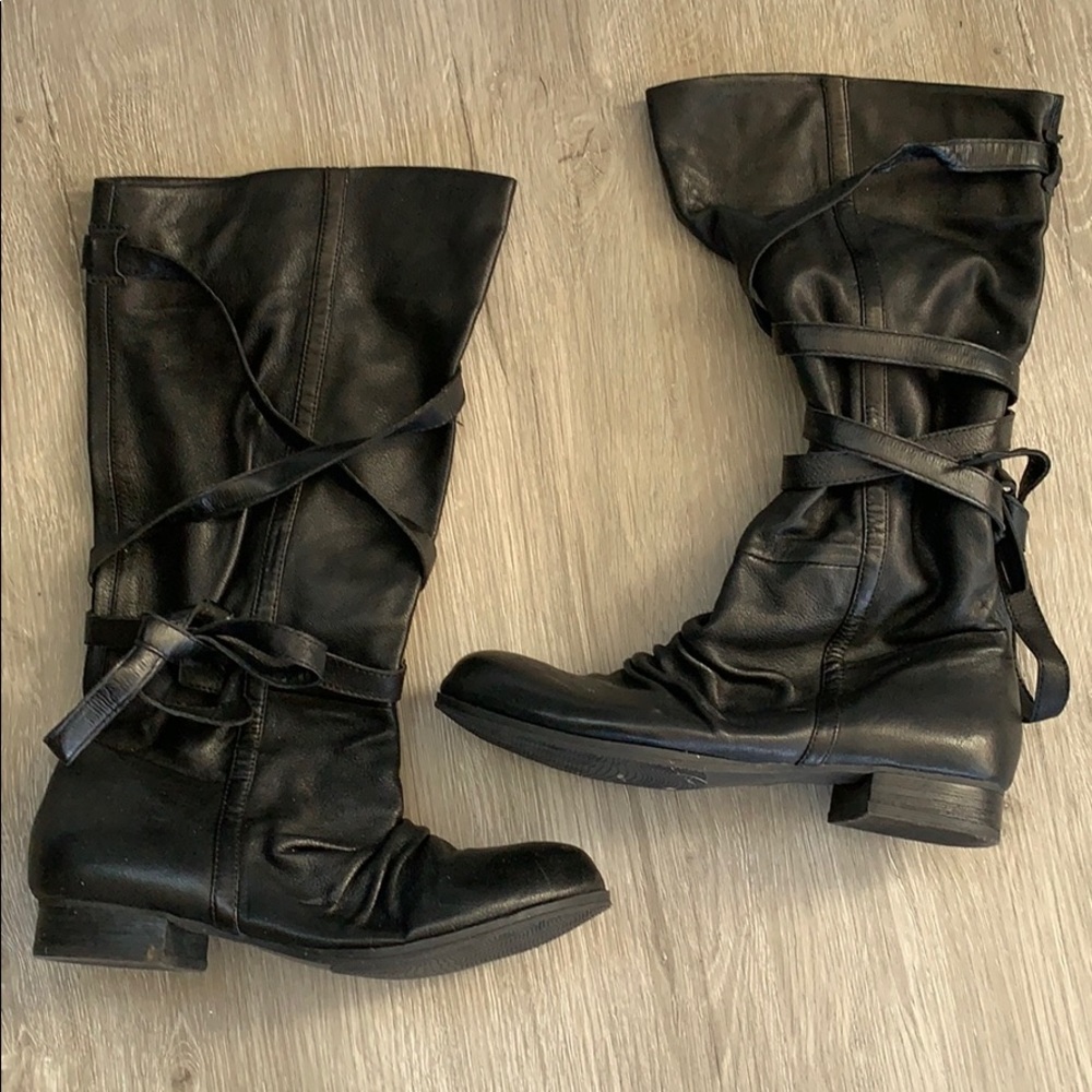 Tall black boots with tie around